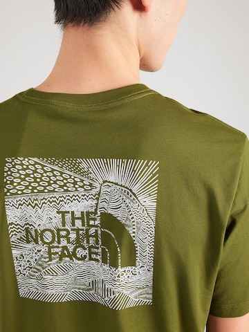 THE NORTH FACE Μπλουζάκι 'NSE CELEBRATION' σε πράσινο