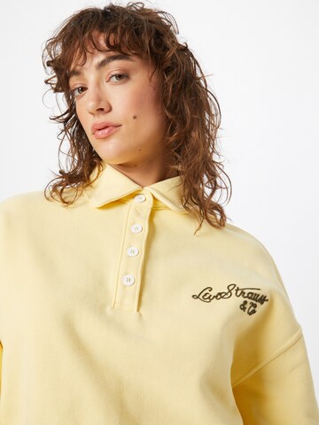 LEVI'S ® - Sudadera 'Graphic Cropped Stevie' en amarillo