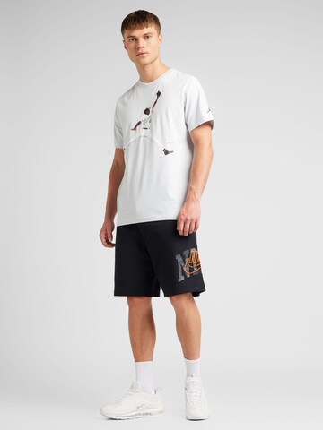 Nike Sportswear Loose fit Sports trousers 'CLUB' in Black