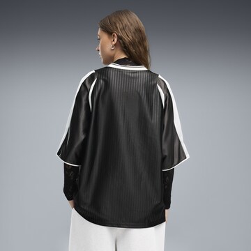 PUMA Shirt in Zwart