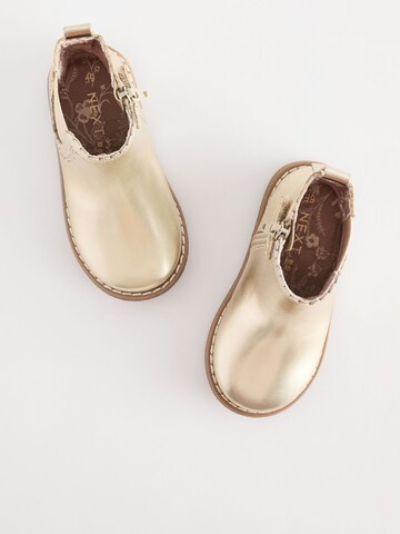 Bottes Next en or