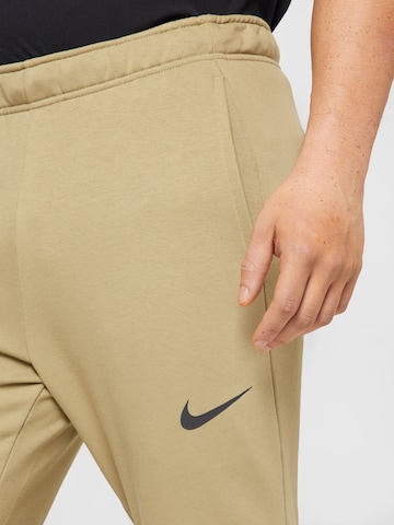 NIKE Tapered Sportbyxa i beige