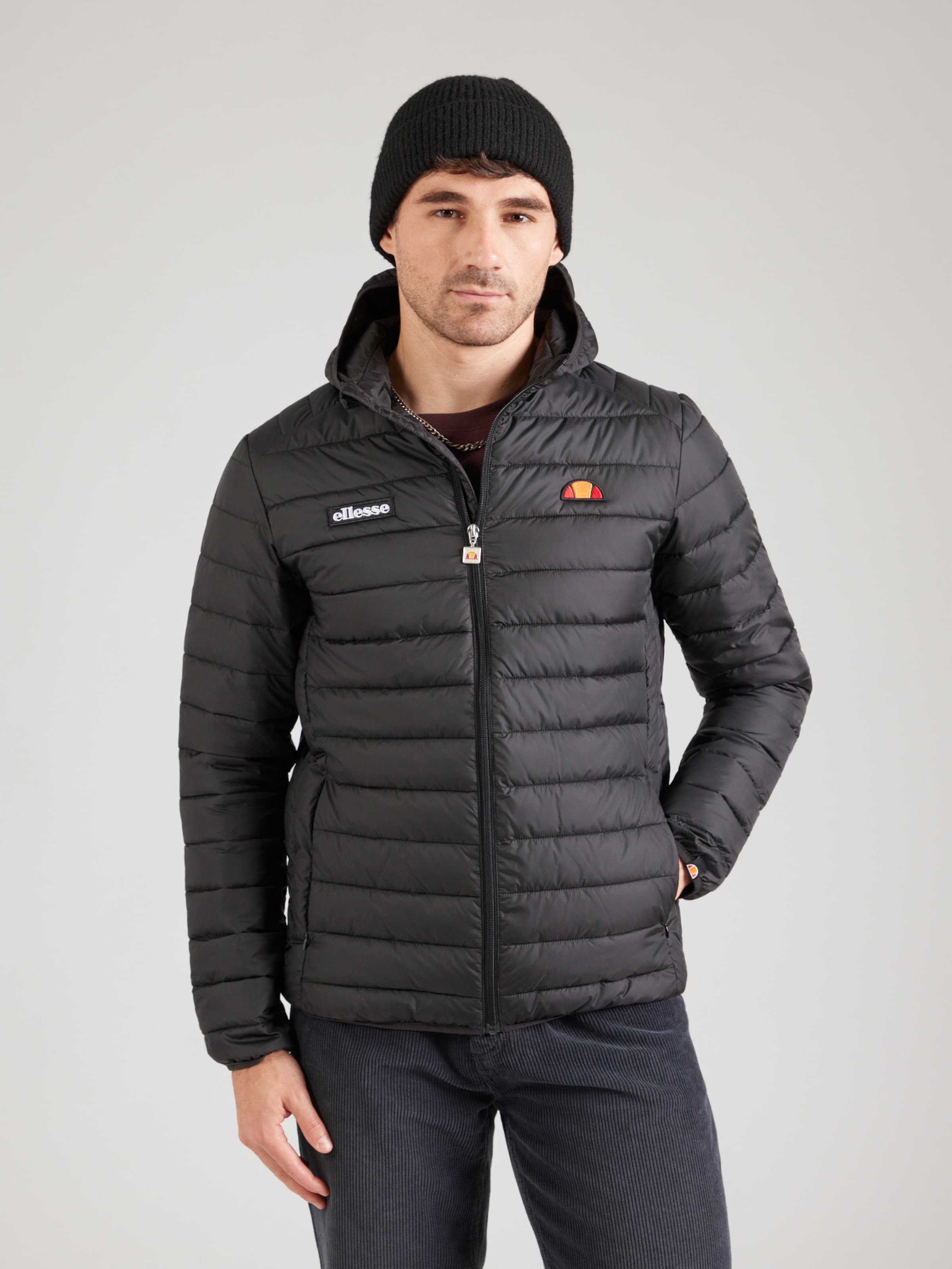 ELLESSE Between-Season Jacket 'Lombardy' in Black | ABOUT YOU