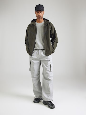 Giacca di mezza stagione 'Tech' di Nike Sportswear in verde