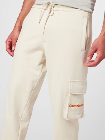 Calvin Klein Jeans Ozke Kargo hlače | bela barva