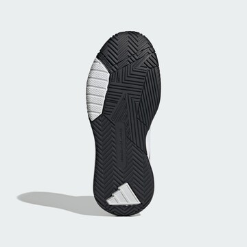Baskets basses 'Own the Game 3' ADIDAS SPORTSWEAR en blanc
