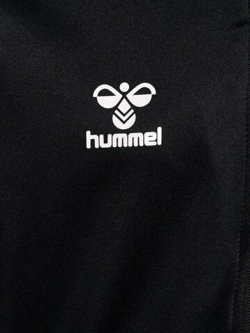 Veste de survêtement 'ESSENTIAL' Hummel en noir