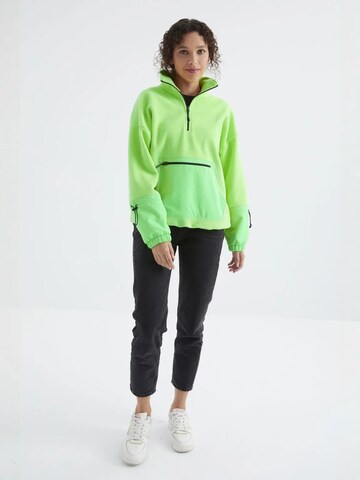 Sweat-shirt Tommy Life en vert