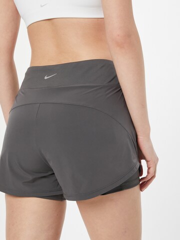 NIKE - Regular Calças de desporto 'Bliss' em cinzento