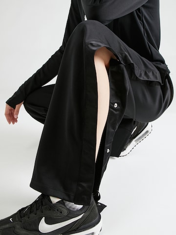 Loosefit Pantaloni 'AIR BREAKAWAY' di Nike Sportswear in nero