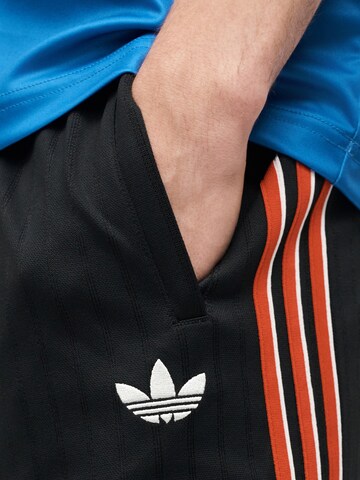 ADIDAS ORIGINALS Свободный крой Штаны 'Firebird' в Черный