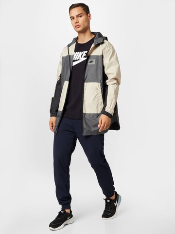 smėlio Nike Sportswear Demisezoninė striukė