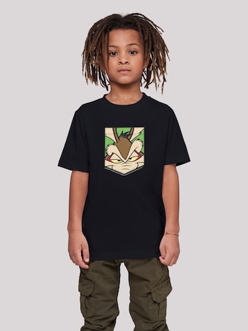 F4NT4STIC Shirt ' Looney Tunes Wile E Coyote Face Faux Pocket' in Zwart: voorkant