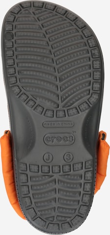 Crocs Avonaiset kengät 'Naruto Classic' värissä oranssi
