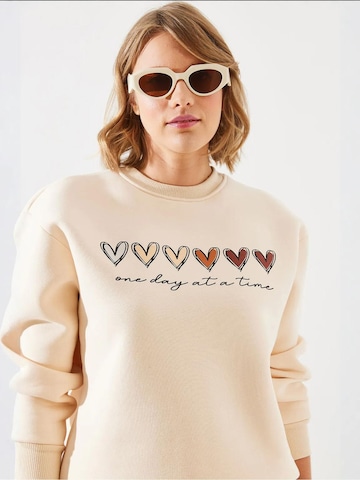 Felpa di Bianco Lucci in beige