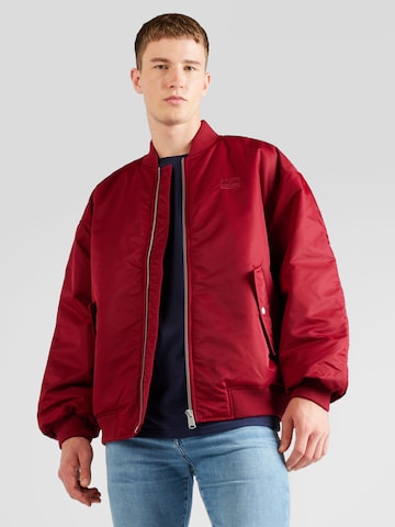 Veste mi-saison Tommy Jeans en rouge : devant