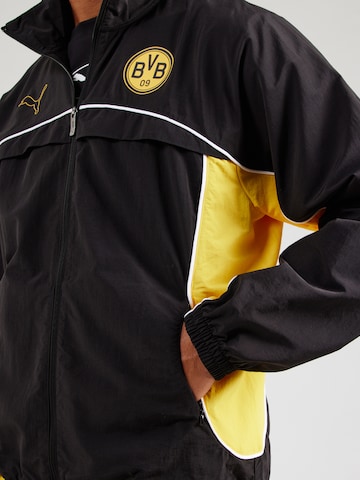 PUMA - Chaqueta deportiva 'BVB FtblStatement Cellerat' en negro