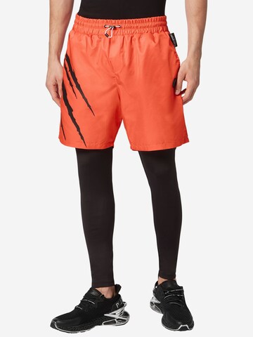 Plein Sport Skinny Sports trousers in Orange: front