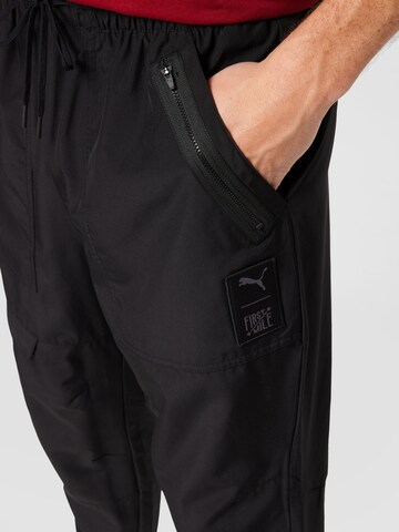 PUMA Loose fit Workout Pants 'First Mile' in Black