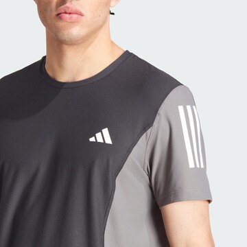 ADIDAS PERFORMANCE Functioneel shirt 'Own The Run' in Zwart