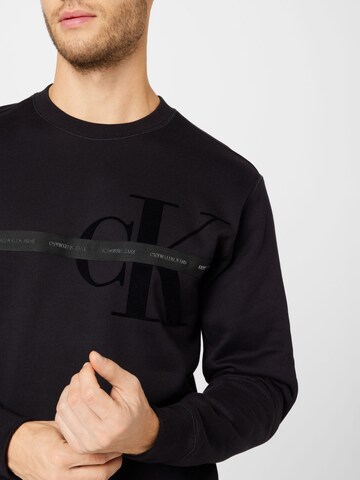 Calvin Klein Jeans Sweatshirt i svart