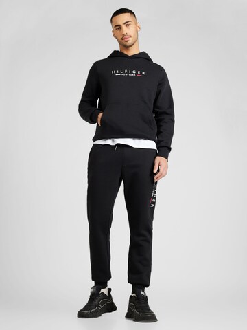 TOMMY HILFIGER - Ropa para correr en negro