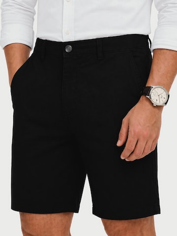 comeor Chinohose in Schwarz: Vorderseite