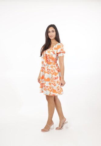 Elara Kjole i orange