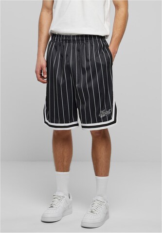 Loosefit Pantalon 'Varsity' Karl Kani en noir : devant