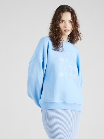 Sweat-shirt 'June' florence by mills exclusive for ABOUT YOU en bleu : devant