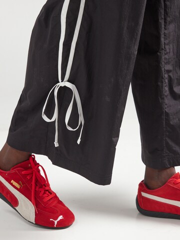 PUMA Широкий Штаны 'MODERN DELIGHT' в Черный