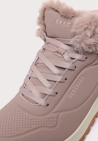purpurinė SKECHERS Suvarstomieji kulkšnis dengiantys batai 'UNO RUGGED'