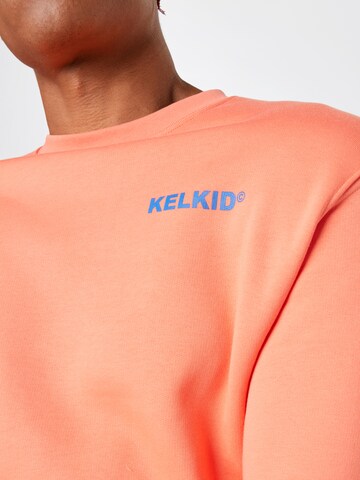 ABOUT YOU x Mero Sweatshirt 'Kelkid' in Orange