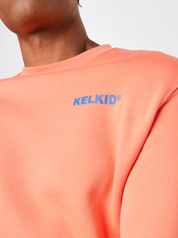 Bluză de molton 'Kelkid' de la ABOUT YOU x Mero pe portocaliu