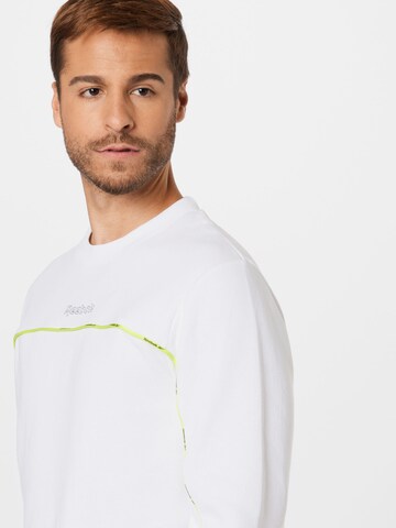 Reebok - Camiseta deportiva en blanco