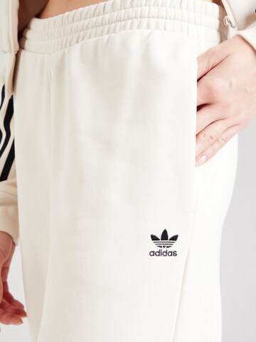 ADIDAS ORIGINALS Loose fit Trousers 'Ess' in Beige