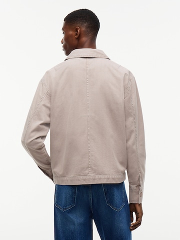Veste mi-saison 'ESSENTIAL' Tommy Jeans en gris