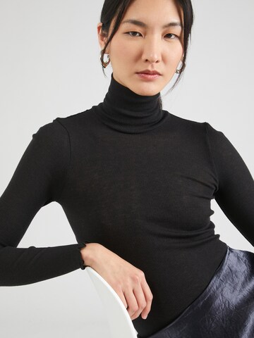 juoda rosemunde Megztinis