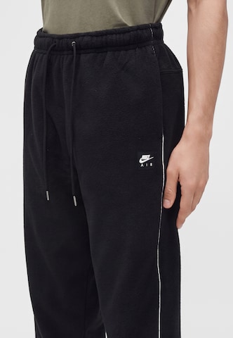 Effilé Pantalon 'Air' Nike Sportswear en noir