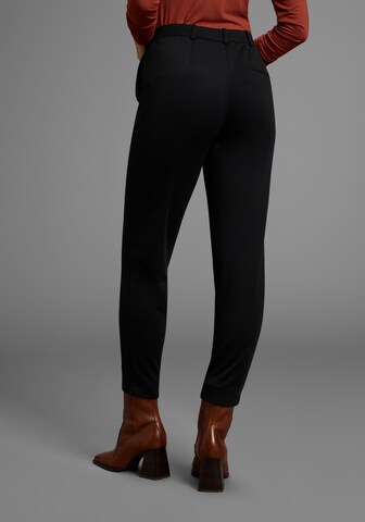 LAURA SCOTT Skinny Pants in Black