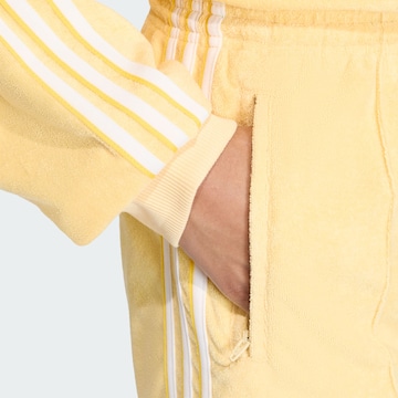 Loosefit Pantalon 'Firebird' ADIDAS ORIGINALS en jaune