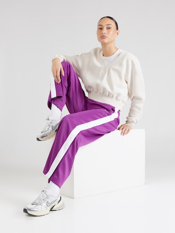 Nike Sportswear Široký strih Nohavice - fialová