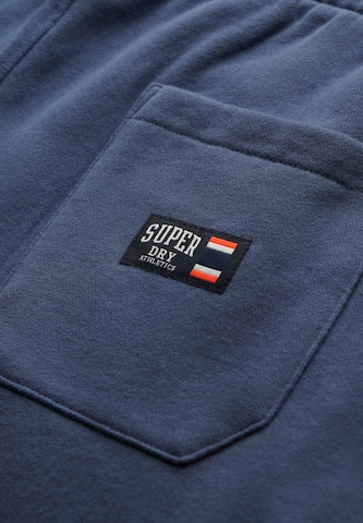 Superdry Tapered Hose in Blau