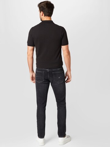 Coupe slim Jean 'Austin' Tommy Jeans en noir