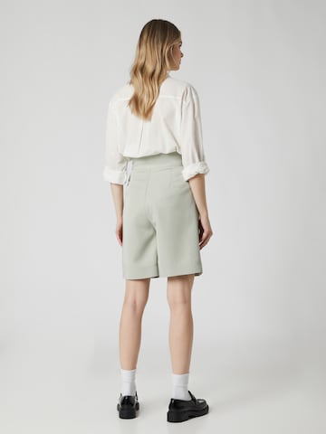 Guido Maria Kretschmer Women - Skinny Pantalón plisado 'Dunja' en verde: atrás