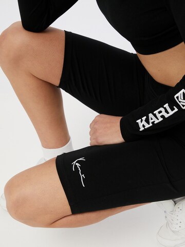 Karl Kani Skinny Shorts in Schwarz