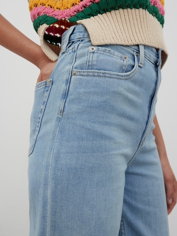 EDITED Wide Leg Jeans 'Avery' i blå