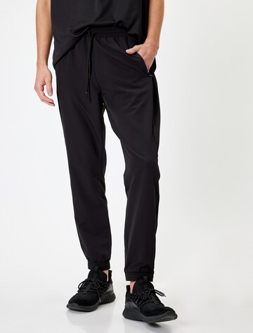 Koton Tapered Broek in Zwart: voorkant