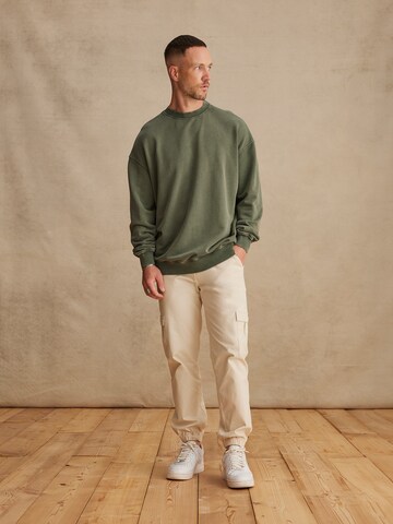 DAN FOX APPAREL Tapered Παντελόνι cargo 'Damon' σε λευκό