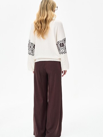 Blue Shadow Sweater in Beige